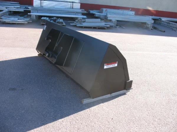 Perforated top on snow bucket for volume and great visibility.